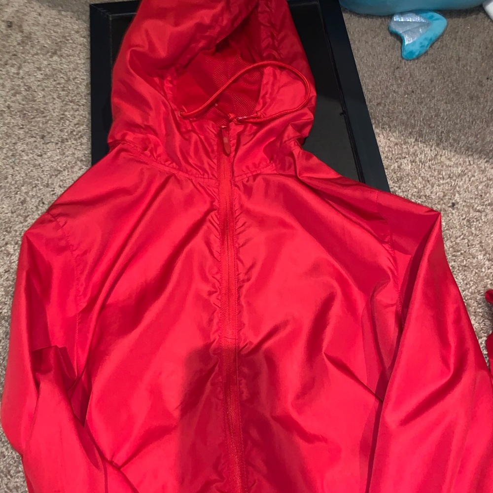 Red windbreaker